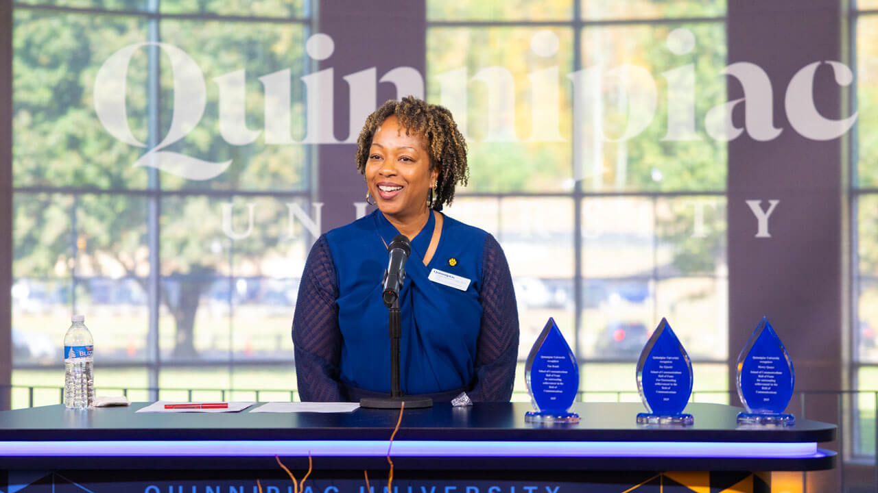 Dean Nadine Barnett Cosby talking to a crowd